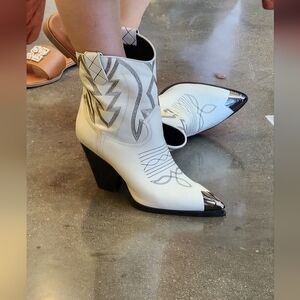 Stylish White Ankle Boots with Black Accents